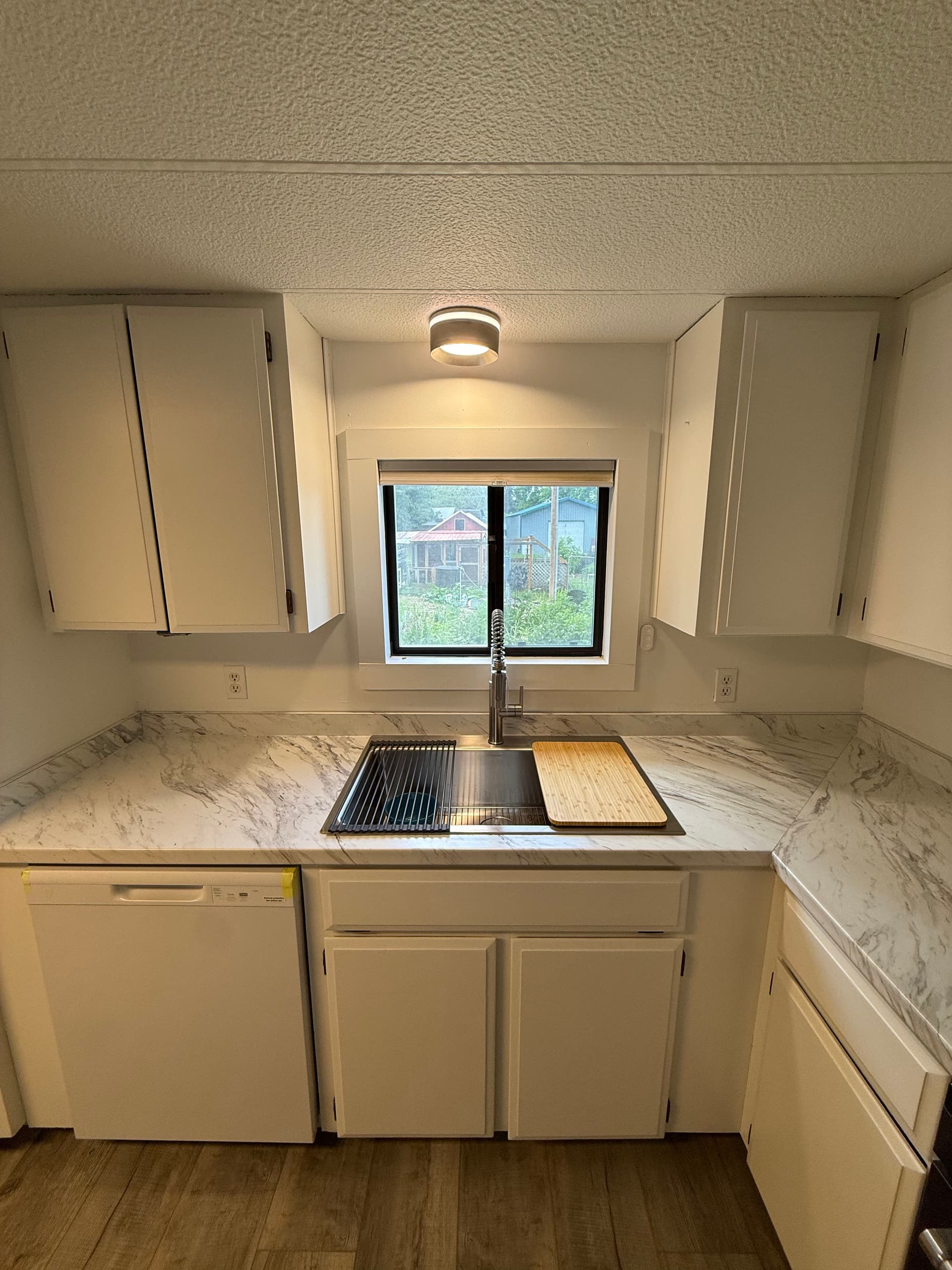 Gallery photos for Cabinet Refinish and New Countertops Turn a Dated Kitchen Bright: Image #5