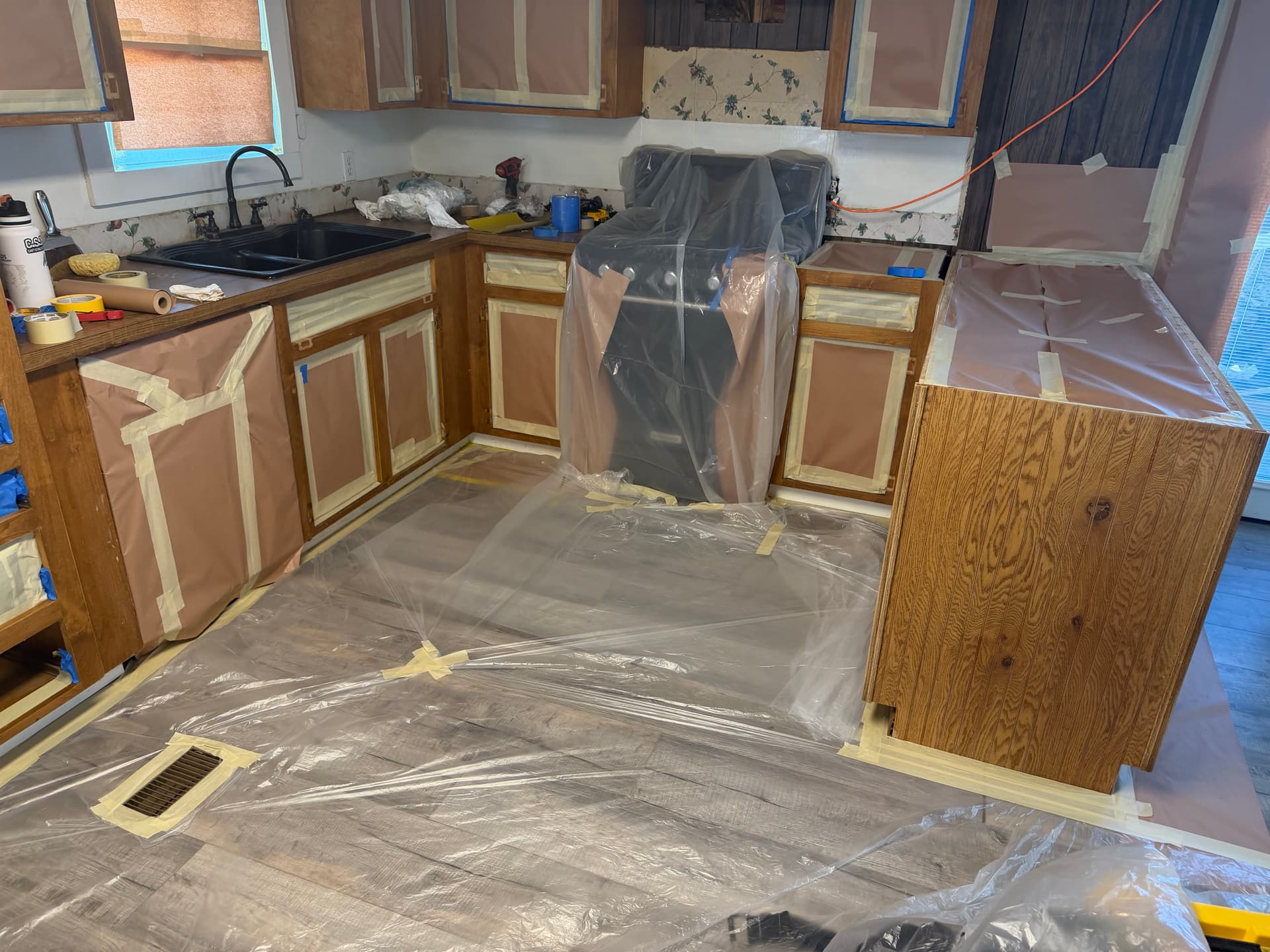 Gallery photos for Cabinet Refinish and New Countertops Turn a Dated Kitchen Bright: Image #1